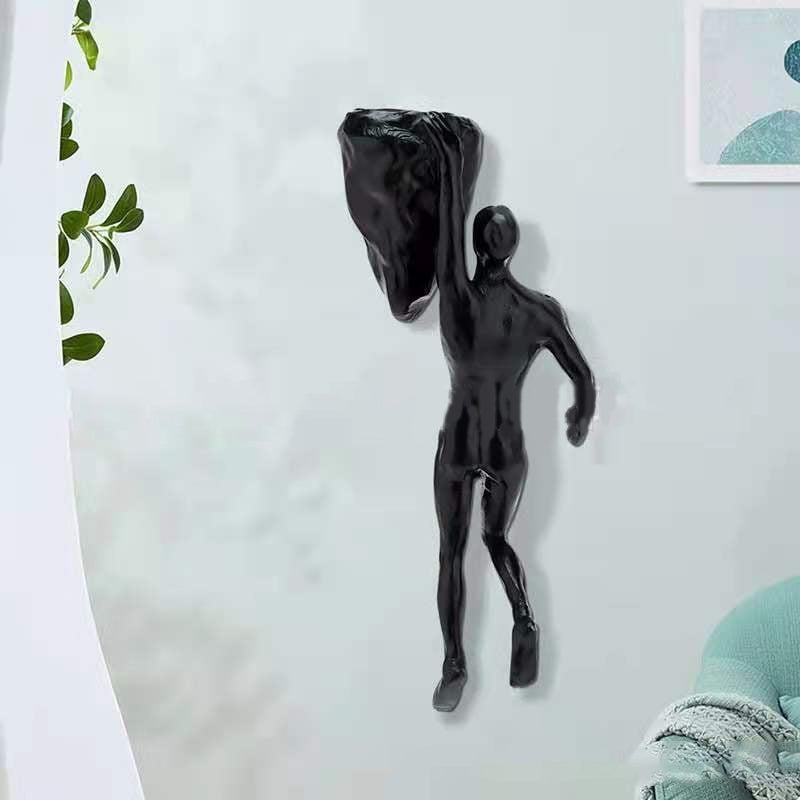 Klatervägg hängande statyer