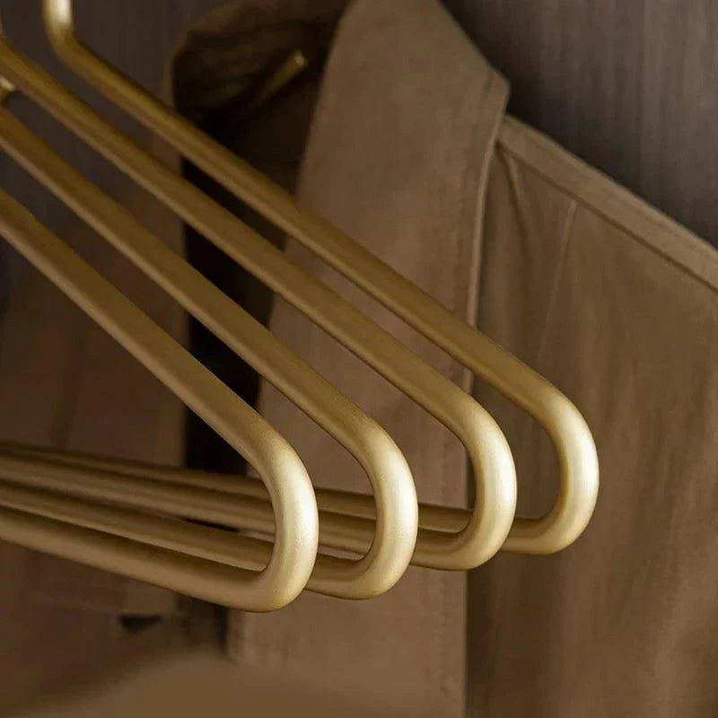 5 stycken klädhängare i massivt matt guld/silver │ Sömlös garderobsorganisatör i metall