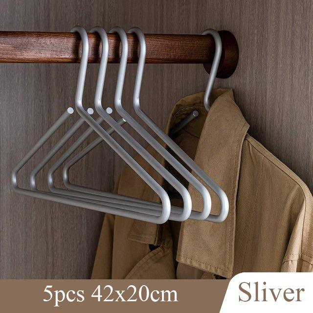 5 stycken klädhängare i massivt matt guld/silver │ Sömlös garderobsorganisatör i metall
