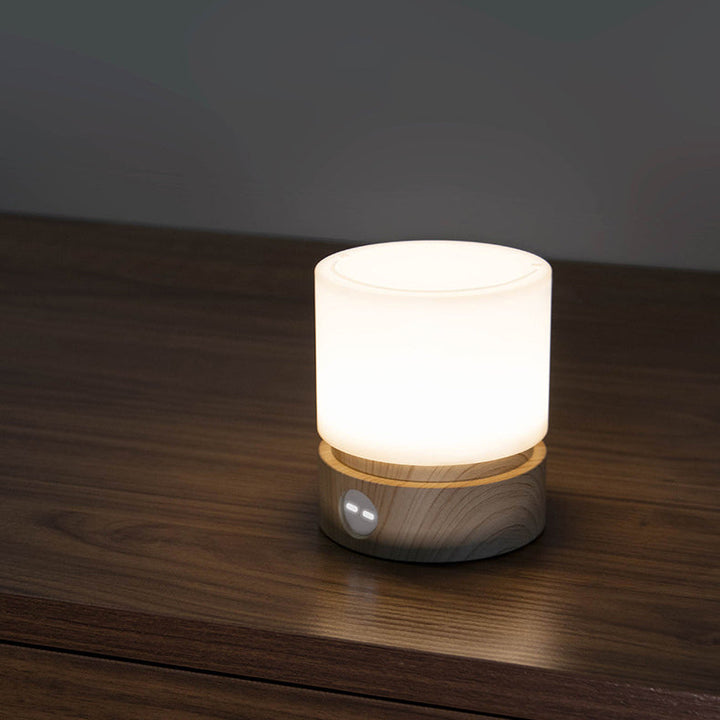 Samtida Nordisk Timer Uppladdningsbar ABS HIPS Silikon Cylinder LED Bordslampa Nattljus för Nattduksbord