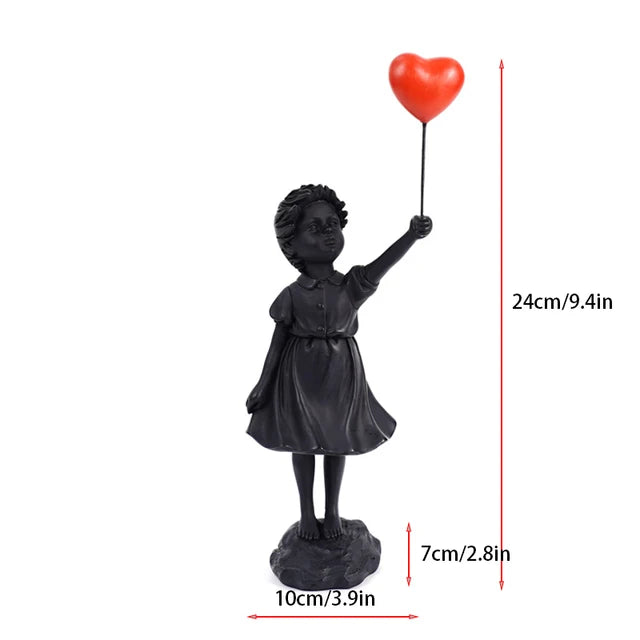 Skulptur av en flicka med ballong i Banksy-stil för bordsdekoration och kreativ inredning av vardagsrum