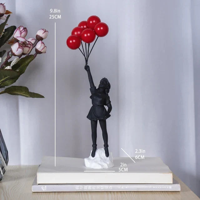 Skulptur av en flicka med ballong i Banksy-stil för bordsdekoration och kreativ inredning av vardagsrum