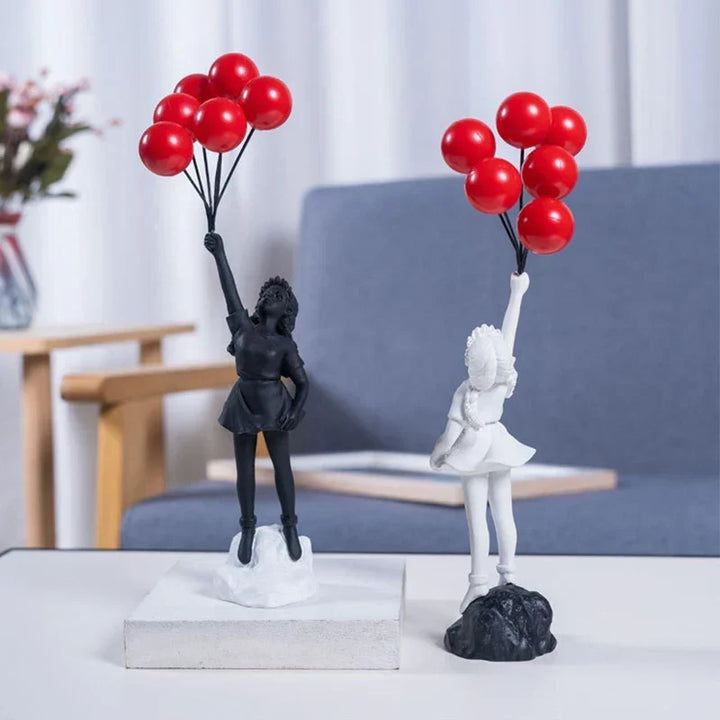 Skulptur av en flicka med ballong i Banksy-stil för bordsdekoration och kreativ inredning av vardagsrum