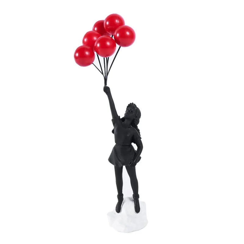 Skulptur av en flicka med ballong i Banksy-stil för bordsdekoration och kreativ inredning av vardagsrum