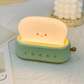 TinyToast Bordslampa – Bärbar Brödrost-formad Nattlampa med Dimbara LED-lampor och USB-port