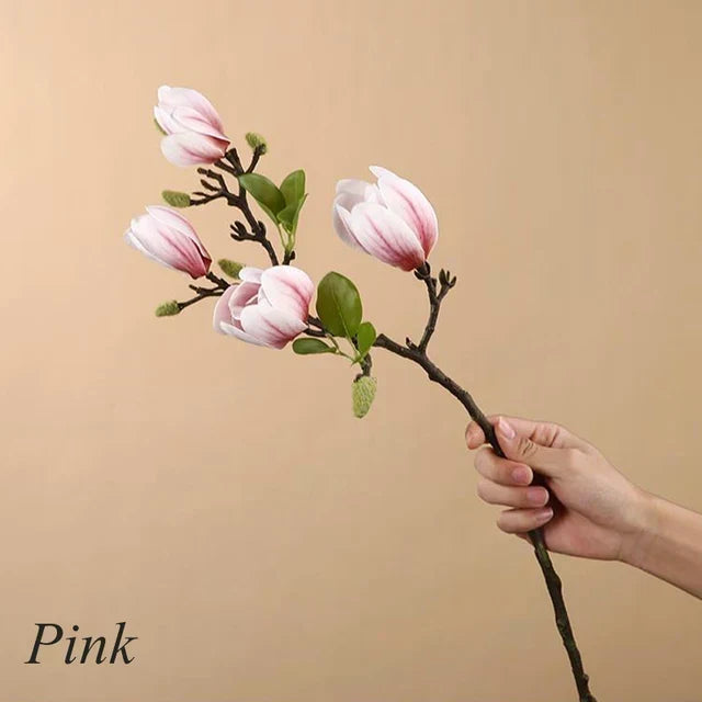 Livaktiga konstgjorda magnoliagrenar