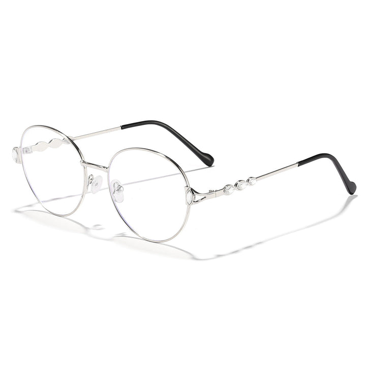 Kvinnors runda solglasögon med elegant metallram och spegelglas