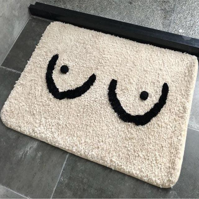 Badmatta med bröst