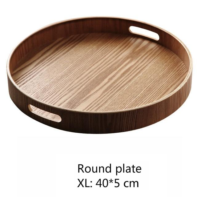 Slimma, runda serveringsfat i trä