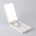 Resande makeupborsteset med LED-ljus spegel