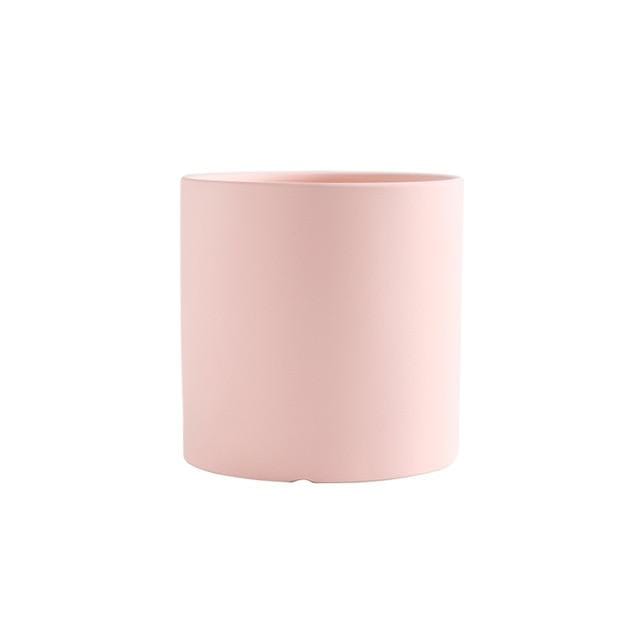 Färgglada keramiska blomkrukor